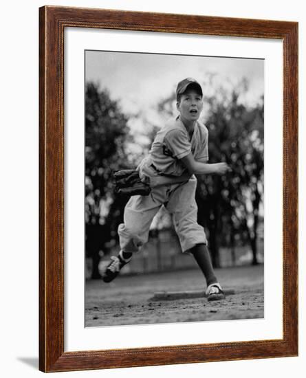 Boy Playing a Game of Little League Baseball-Yale Joel-Framed Photographic Print