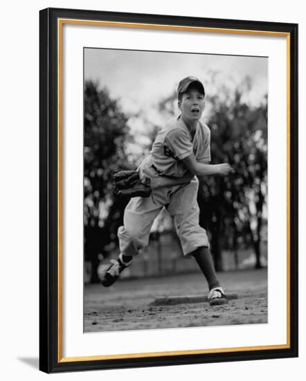 Boy Playing a Game of Little League Baseball-Yale Joel-Framed Photographic Print