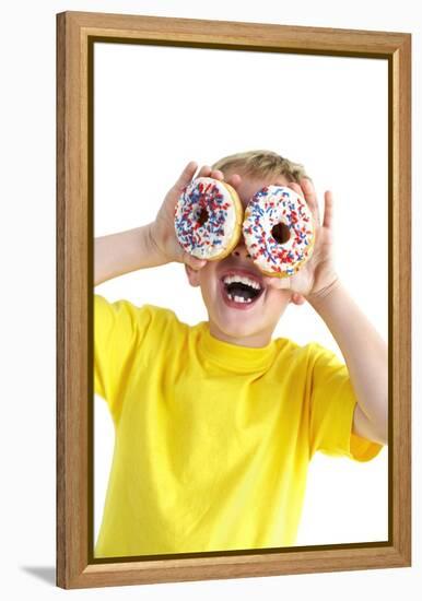 Boy Playing with Doughnuts-Ian Boddy-Framed Premier Image Canvas