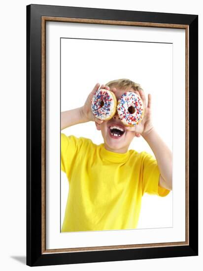 Boy Playing with Doughnuts-Ian Boddy-Framed Photographic Print