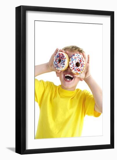 Boy Playing with Doughnuts-Ian Boddy-Framed Photographic Print