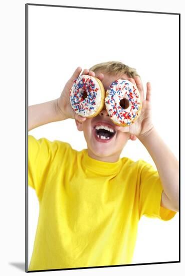 Boy Playing with Doughnuts-Ian Boddy-Mounted Photographic Print