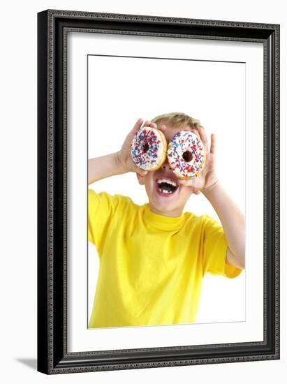 Boy Playing with Doughnuts-Ian Boddy-Framed Photographic Print