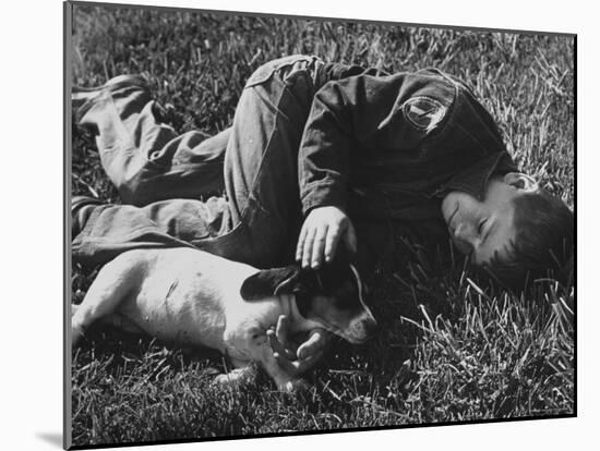 Boy Playing with His Pet Dog-Ed Clark-Mounted Photographic Print