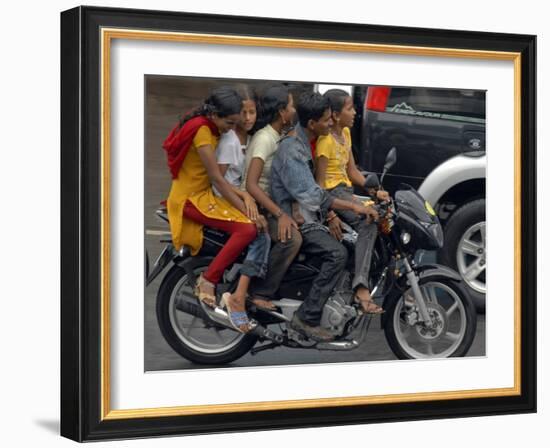 Boy Rides a Motorbike with Four Girls, as it Drizzles in Hyderabad, India-null-Framed Photographic Print