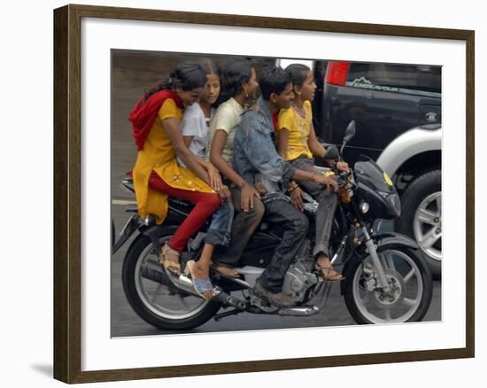 Boy Rides a Motorbike with Four Girls, as it Drizzles in Hyderabad, India-null-Framed Photographic Print