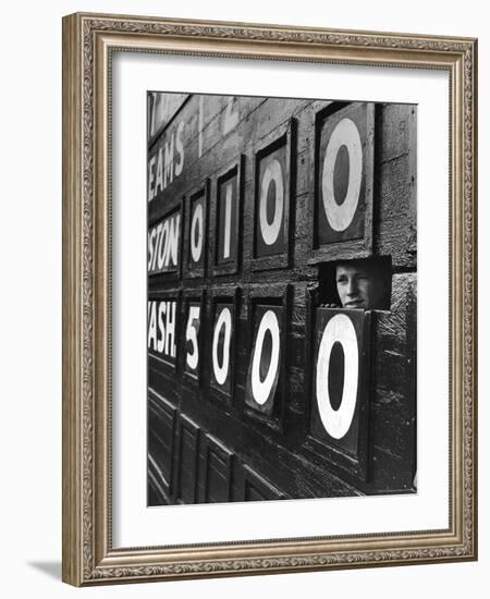 Boy Running Scoreboard at Griffith Stadium During the Baseball Game-Hank Walker-Framed Photographic Print