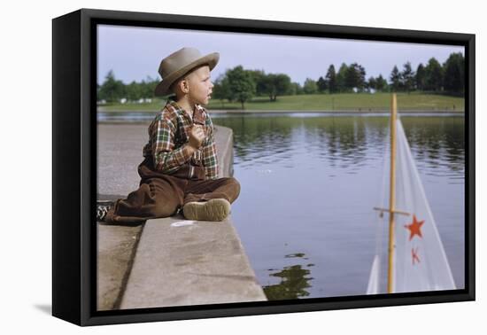 Boy Sitting by Lake in Cowboy Hat-William P. Gottlieb-Framed Premier Image Canvas