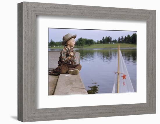 Boy Sitting by Lake in Cowboy Hat-William P. Gottlieb-Framed Photographic Print