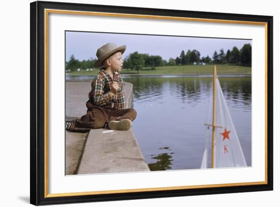 Boy Sitting by Lake in Cowboy Hat-William P. Gottlieb-Framed Photographic Print