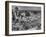 Boy Sitting on Rock Ledge Above Refugee Camp-Margaret Bourke-White-Framed Photographic Print