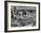 Boy Sitting on Rock Ledge Above Refugee Camp-Margaret Bourke-White-Framed Photographic Print