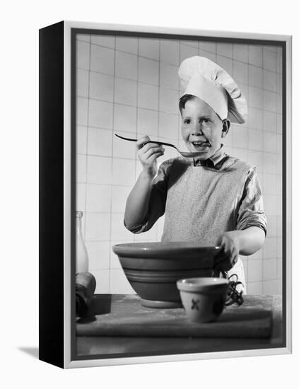 Boy Tasting His Cooking-Philip Gendreau-Framed Premier Image Canvas