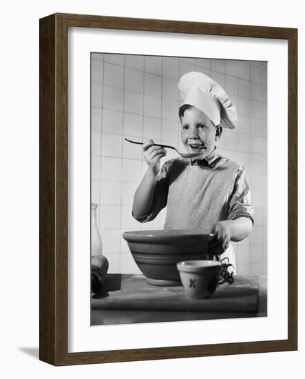 Boy Tasting His Cooking-Philip Gendreau-Framed Photographic Print