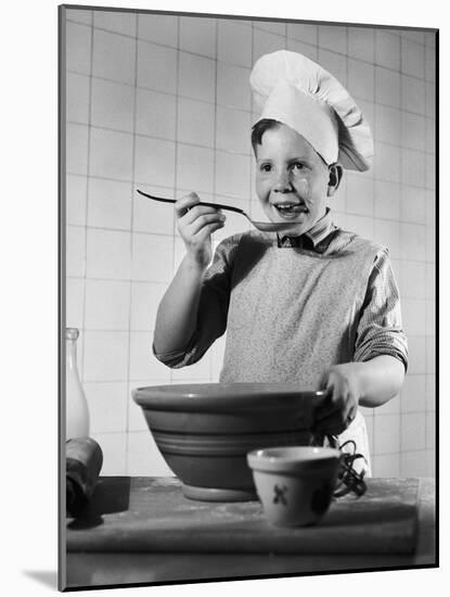 Boy Tasting His Cooking-Philip Gendreau-Mounted Photographic Print