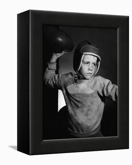 Boy Throwing a Football-Bettmann-Framed Premier Image Canvas