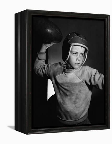 Boy Throwing a Football-Bettmann-Framed Premier Image Canvas