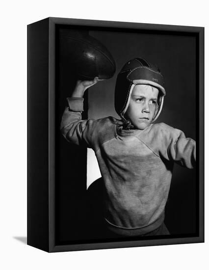 Boy Throwing a Football-Bettmann-Framed Premier Image Canvas