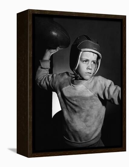 Boy Throwing a Football-Bettmann-Framed Premier Image Canvas