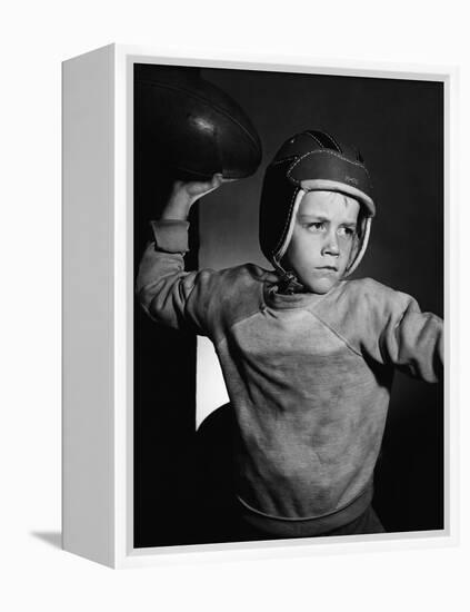 Boy Throwing a Football-Bettmann-Framed Premier Image Canvas