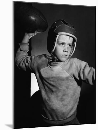 Boy Throwing a Football-Bettmann-Mounted Photographic Print