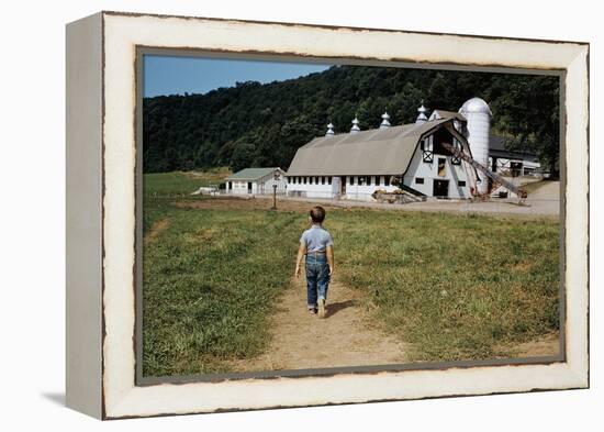 Boy Walking Towards a Barn-William P. Gottlieb-Framed Premier Image Canvas