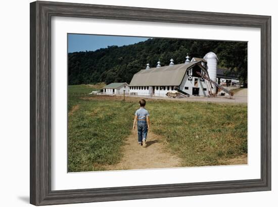 Boy Walking Towards a Barn-William P. Gottlieb-Framed Photographic Print