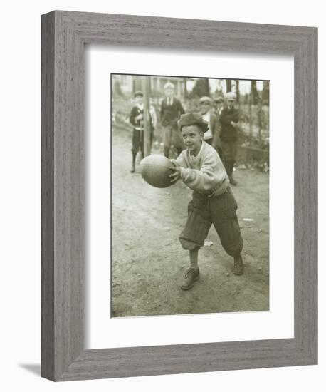 Boy with Football, Early 1900s-Marvin Boland-Framed Giclee Print