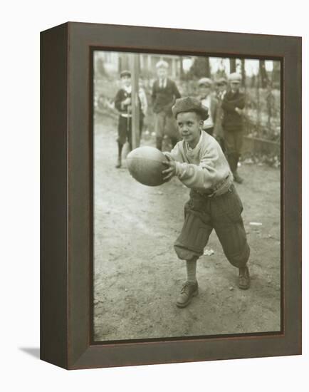 Boy with Football, Early 1900s-Marvin Boland-Framed Premier Image Canvas