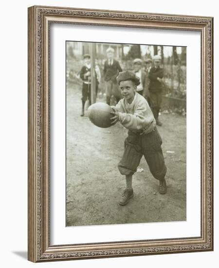 Boy with Football, Early 1900s-Marvin Boland-Framed Giclee Print