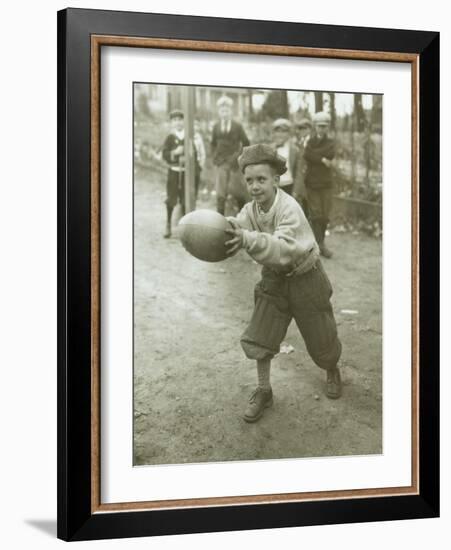 Boy with Football, Early 1900s-Marvin Boland-Framed Giclee Print