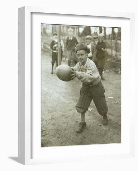 Boy with Football, Early 1900s-Marvin Boland-Framed Giclee Print