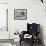 Boy with Punching Ball in the Living Room-null-Framed Photo displayed on a wall