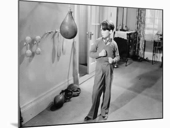 Boy with Punching Ball in the Living Room-null-Mounted Photo