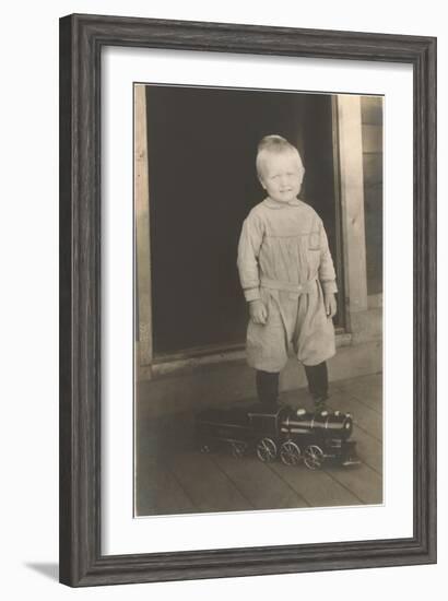 Boy with Toy Locomotive-null-Framed Art Print