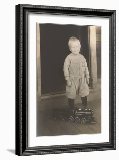 Boy with Toy Locomotive-null-Framed Art Print