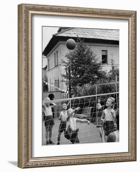 Boys and Girls Playing Volleyball-Lisa Larsen-Framed Photographic Print