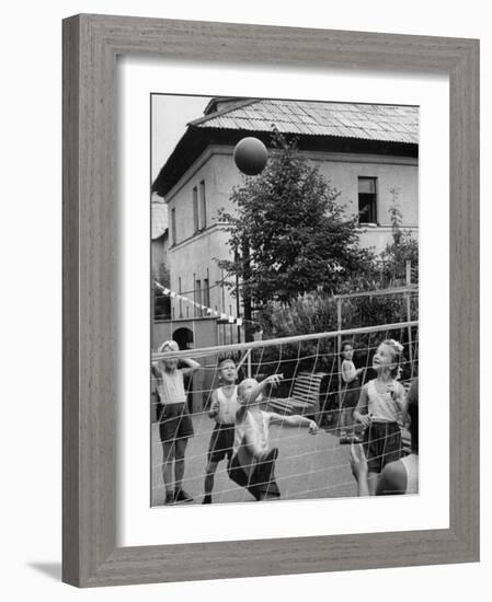 Boys and Girls Playing Volleyball-Lisa Larsen-Framed Photographic Print