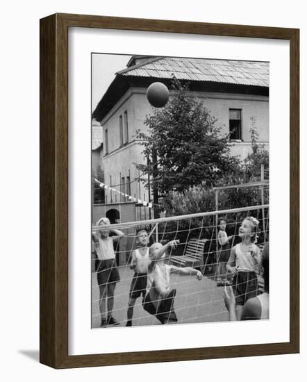 Boys and Girls Playing Volleyball-Lisa Larsen-Framed Photographic Print