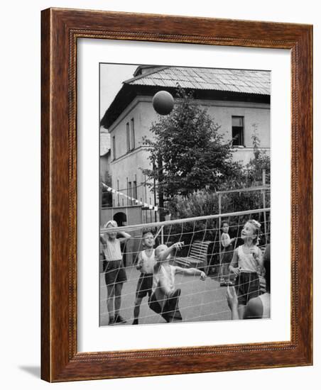 Boys and Girls Playing Volleyball-Lisa Larsen-Framed Photographic Print