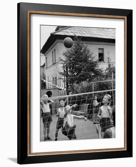 Boys and Girls Playing Volleyball-Lisa Larsen-Framed Photographic Print