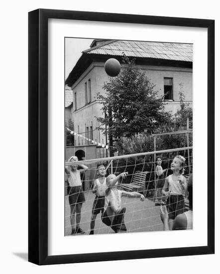 Boys and Girls Playing Volleyball-Lisa Larsen-Framed Photographic Print