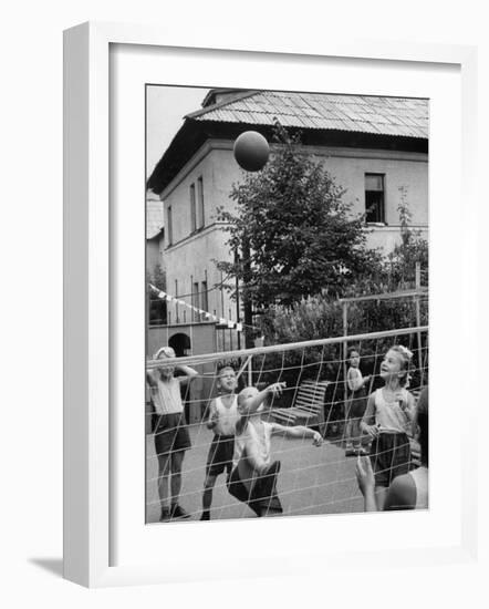 Boys and Girls Playing Volleyball-Lisa Larsen-Framed Photographic Print