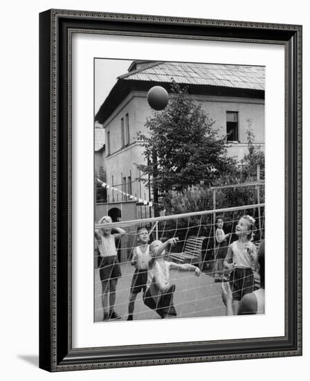 Boys and Girls Playing Volleyball-Lisa Larsen-Framed Photographic Print