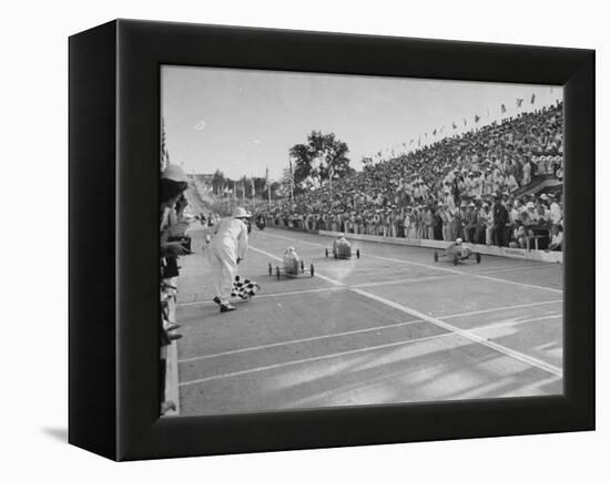 Boys and their Cars Crossing the Finish Line During the Soap Box Derby-Carl Mydans-Framed Premier Image Canvas