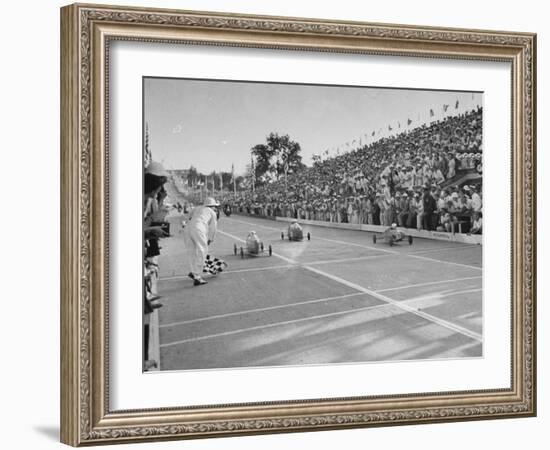 Boys and their Cars Crossing the Finish Line During the Soap Box Derby-Carl Mydans-Framed Photographic Print