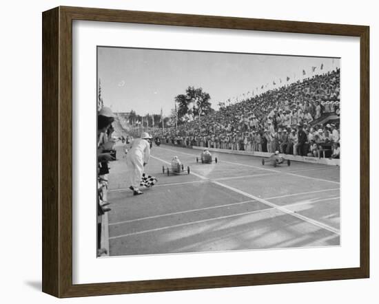 Boys and their Cars Crossing the Finish Line During the Soap Box Derby-Carl Mydans-Framed Photographic Print