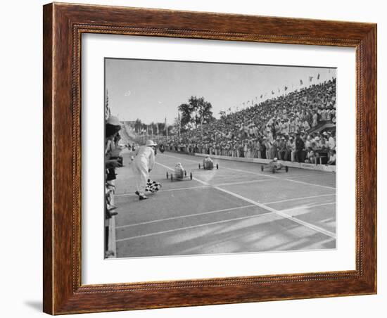 Boys and their Cars Crossing the Finish Line During the Soap Box Derby-Carl Mydans-Framed Photographic Print