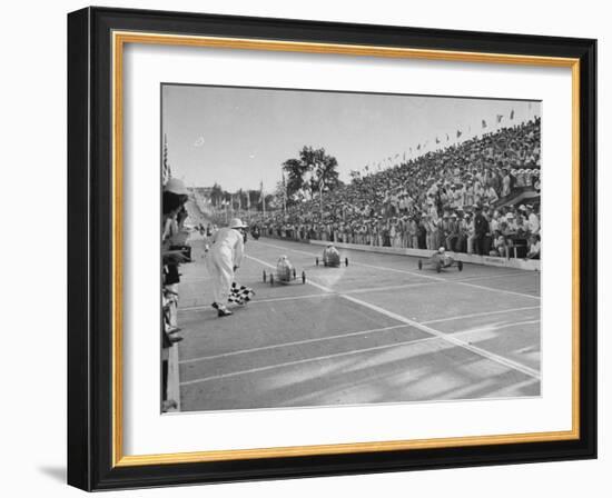 Boys and their Cars Crossing the Finish Line During the Soap Box Derby-Carl Mydans-Framed Photographic Print