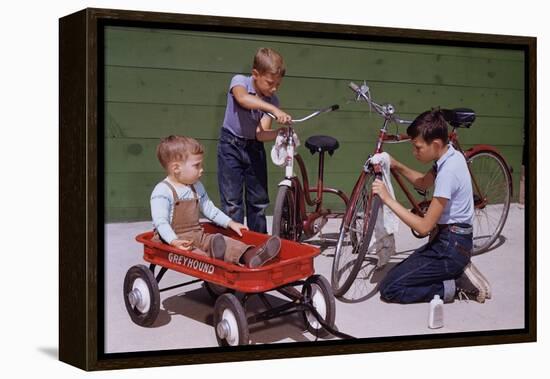 Boys Cleaning their Bikes-William P. Gottlieb-Framed Premier Image Canvas